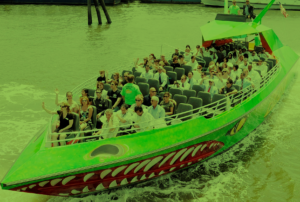 The Beast speedboat leaving the pier with passengers on board