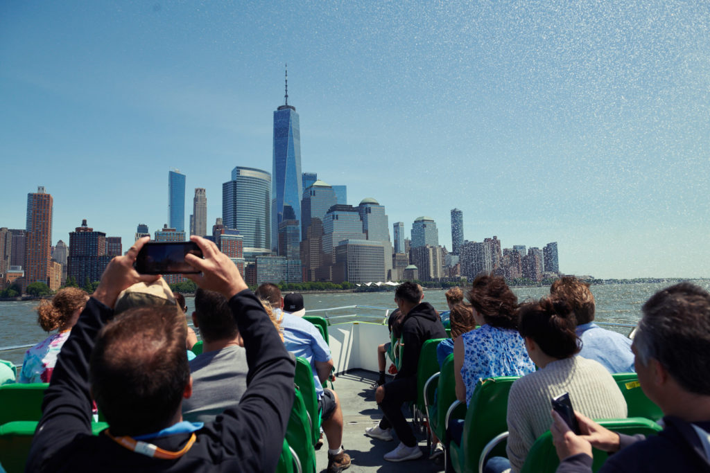 Passengers taking photos of One World Trade from The Beast